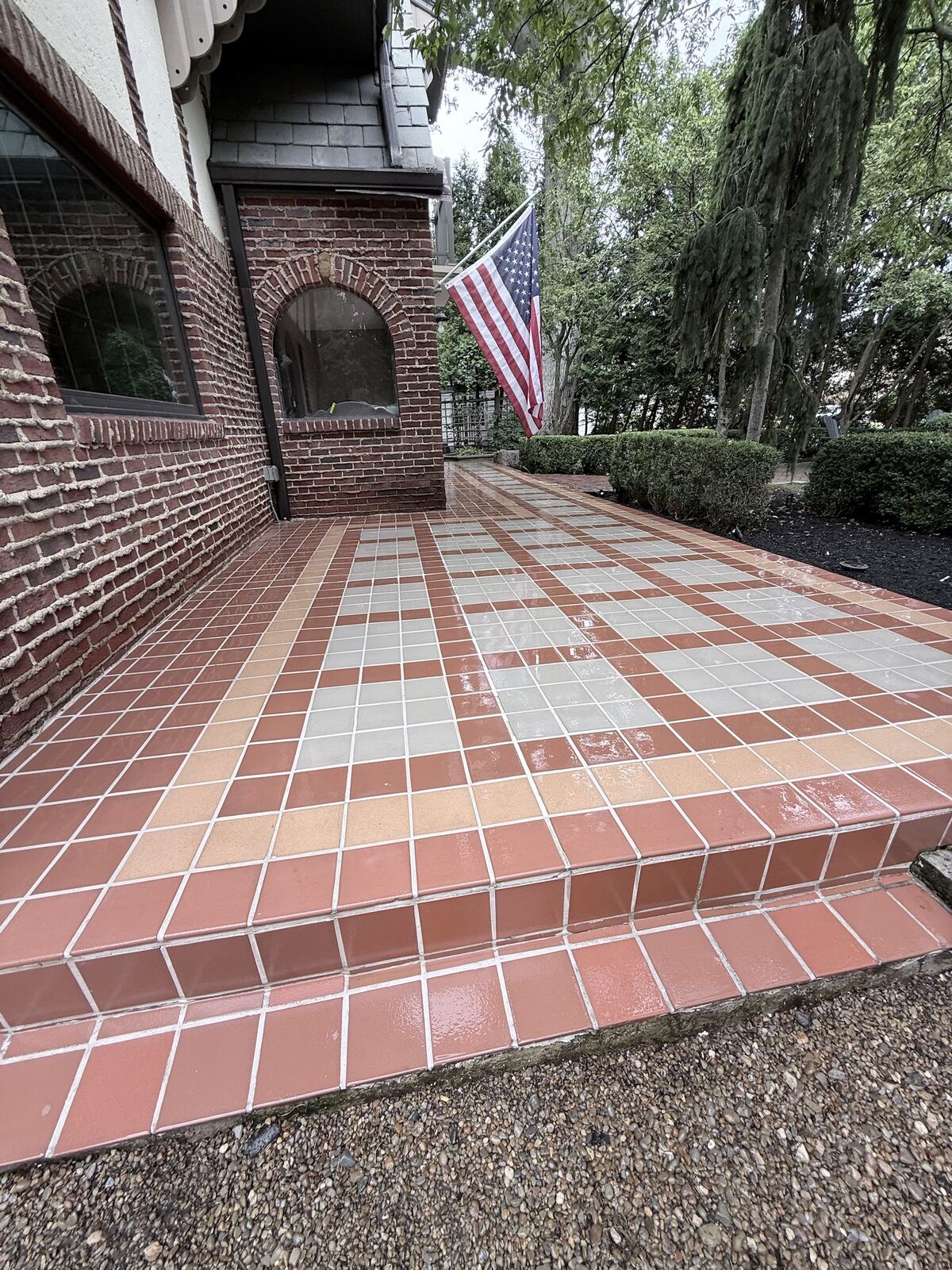 Restored mosaic tile patio walkway